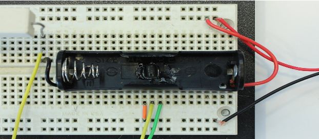 Battery attached to breadboard